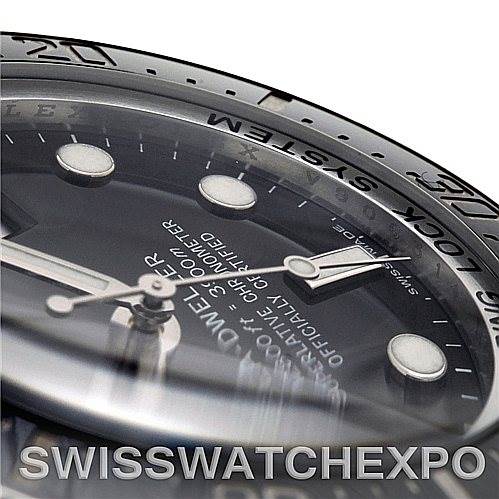 Close-up angled view of the Rolex Sea-Dweller 116660 Men's Stainless Steel Black Dial 116660 Men's Stainless Steel Black Dial watch, showing the dial, hands, and part of the bezel.