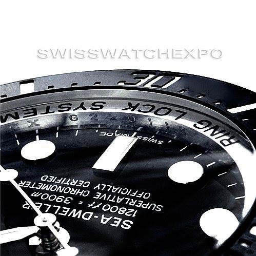 The image shows a close-up of the dial and bezel of a Rolex Sea-Dweller 116660 Men's Stainless Steel Black Dial 116660 Men's Stainless Steel Black Dial watch, highlighting the "RING LOCK SYSTEM" text and part of the hour markers.