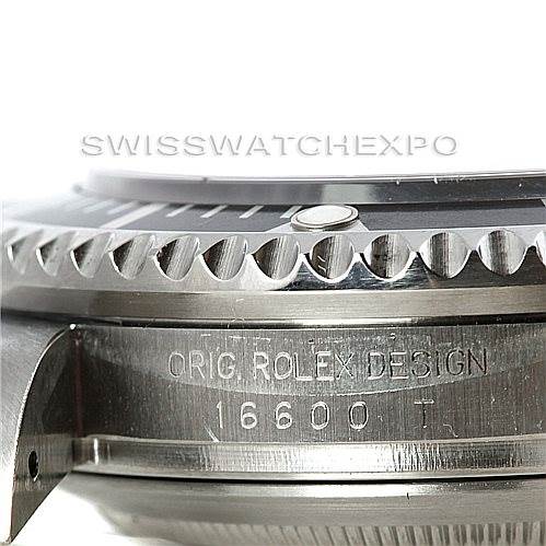 The image shows a close-up of the case side and graduated bezel of a Rolex Sea-Dweller 16600 Men's Stainless Steel Black Dial 16600 Men's Stainless Steel Black Dial model 16600.