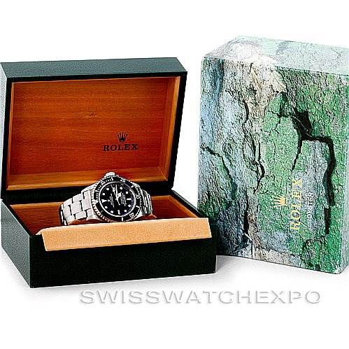 The image shows a Rolex Sea-Dweller 16600 Men's Stainless Steel Black Dial 16600 Men's Stainless Steel Black Dial watch inside its open green box, with the outer packaging placed beside it.