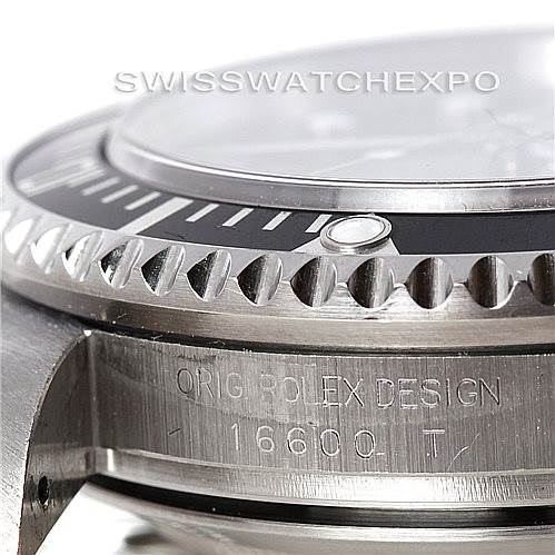 This close-up angle of the Rolex Sea-Dweller 16600 Men's Stainless Steel Black Dial 16600 Men's Stainless Steel Black Dial shows the bezel, crystal, and engraved model number "16600 T".