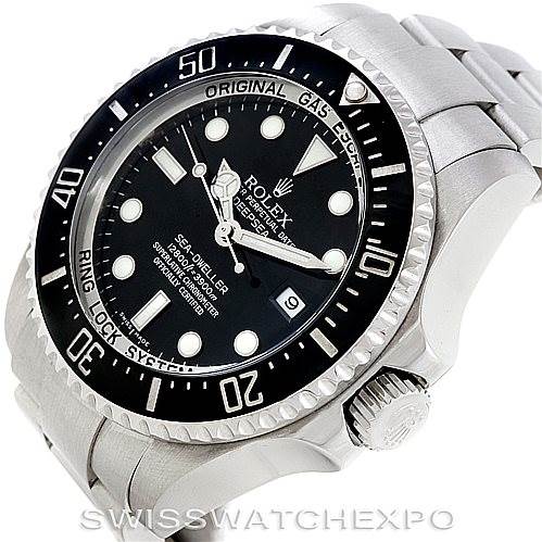 This image shows a close-up angle of the Rolex Sea-Dweller 116660 Men
s Stainless Steel Black Dial 116660 Men
s Stainless Steel Black Dial watch, highlighting the dial, bezel, case, and crown.