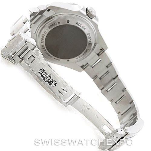 The image shows the backside and clasp of a Rolex Sea-Dweller 116660 Men's Stainless Steel Black Dial 116660 Men's Stainless Steel Black Dial watch, highlighting its engraved case back and metal bracelet.