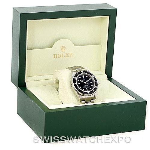 The image shows a Rolex Sea-Dweller 16600 Men's Stainless Steel Black Dial 16600 Men's Stainless Steel Black Dial watch at an angle inside an open green box, highlighting the watch face and bracelet.