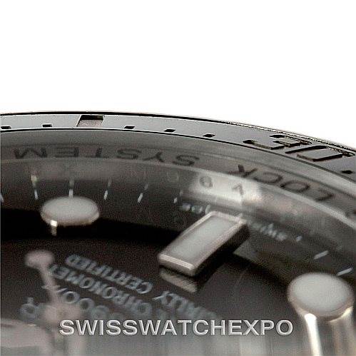Close-up of the bezel and dial of a Rolex Sea-Dweller 116660 Men's Stainless Steel Black Dial 116660 Men's Stainless Steel Black Dial watch, showing text, markers, and part of the bezel edge.