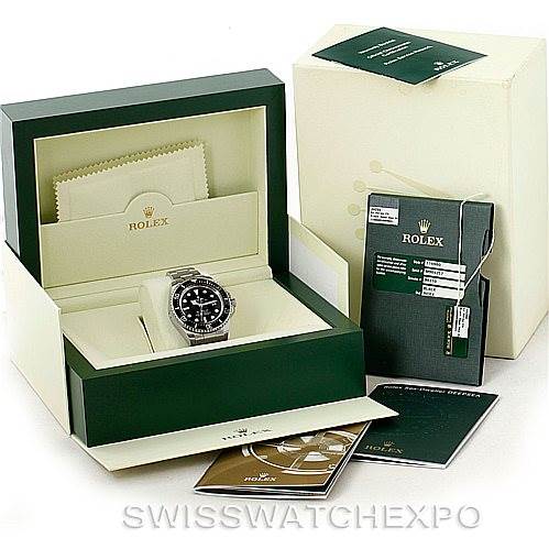 The image shows a Rolex Sea-Dweller 116660 Men's Stainless Steel Black Dial 116660 Men's Stainless Steel Black Dial watch at an angled display, with its open box, warranty cards, and manuals.