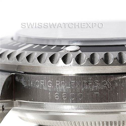 This close-up image shows the side profile of a Rolex Sea-Dweller 16600 Men's Stainless Steel Black Dial 16600 Men's Stainless Steel Black Dial watch, specifically the bezel and the engraved case featuring the model number 16600.