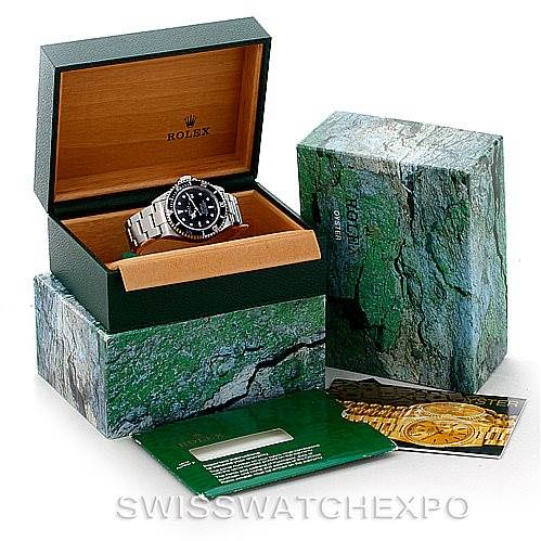 The image shows a Rolex Sea-Dweller 16600 Men's Stainless Steel Black Dial 16600 Men's Stainless Steel Black Dial watch at a 3/4 angle with its open box, outer box, warranty card, and booklet.