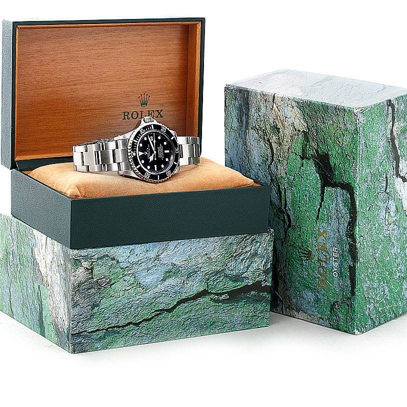 The image shows a Rolex Sea-Dweller 16600 Men's Stainless Steel Black Dial 16600 Men's Stainless Steel Black Dial watch in an open box, with the watch case and bracelet visible.