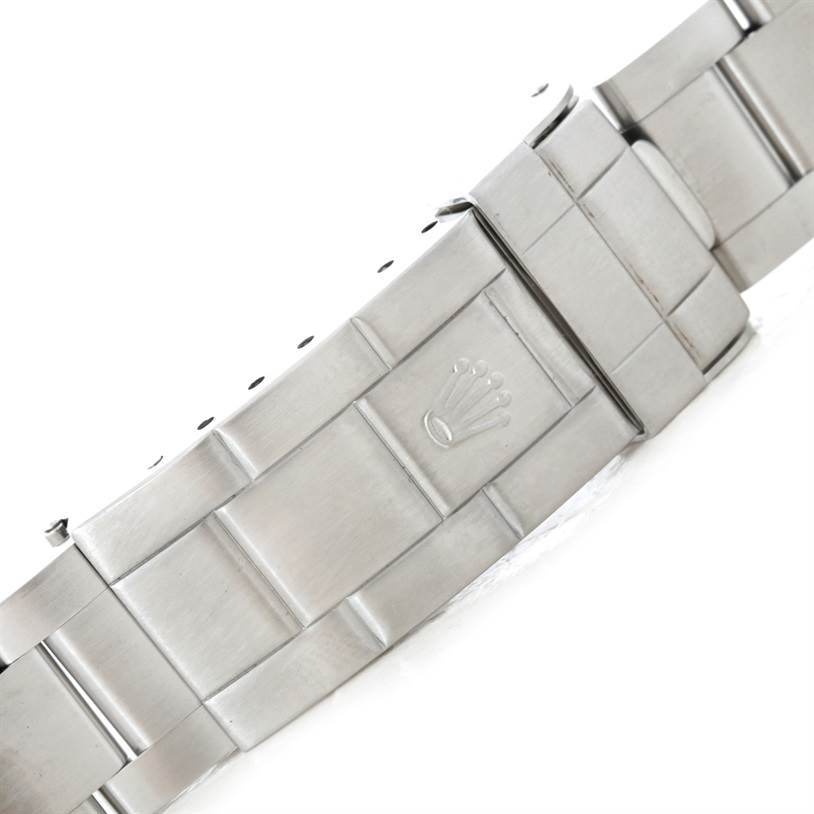 The image shows a close-up of the clasp and part of the bracelet of a Rolex Sea-Dweller 16600 Men
s Stainless Steel Black Dial 16600 Men
s Stainless Steel Black Dial watch.