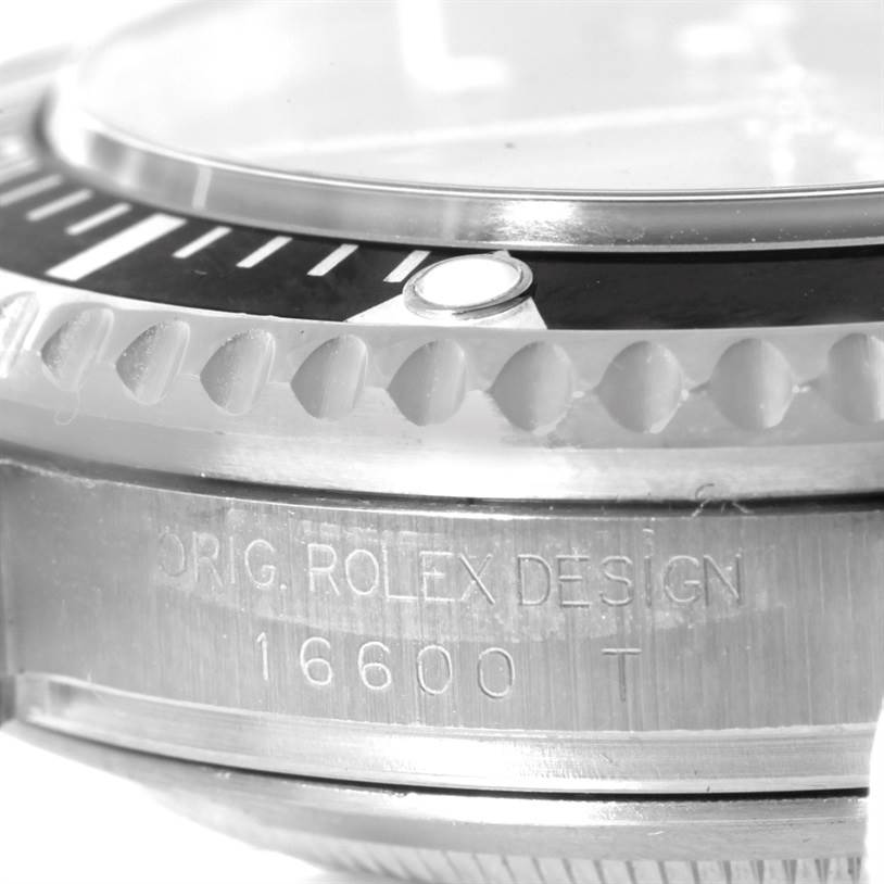 The image shows a close-up of the bezel and engraved side of the Rolex Sea-Dweller 16600 Men
s Stainless Steel Black Dial 16600 Men
s Stainless Steel Black Dial model 16600 watch.