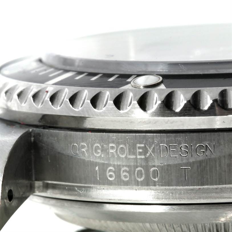 The image shows a close-up side angle of the Rolex Sea-Dweller 16600 Men's Stainless Steel Black Dial 16600 Men's Stainless Steel Black Dial model, highlighting the bezel, case, and engravings.