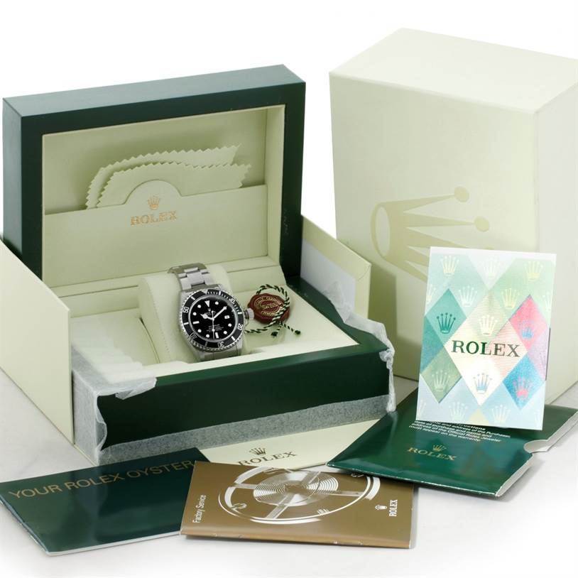 The image shows a Rolex Sea-Dweller 16600 Men's Stainless Steel Black Dial 16600 Men's Stainless Steel Black Dial watch in its box, along with various manuals and accessories.
