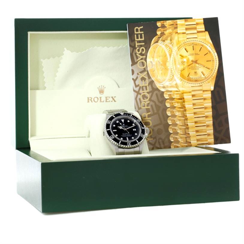 The image shows a Rolex Sea-Dweller 16600 Men's Stainless Steel Black Dial 16600 Men's Stainless Steel Black Dial watch from a front angle, displayed inside its green box with an additional booklet.