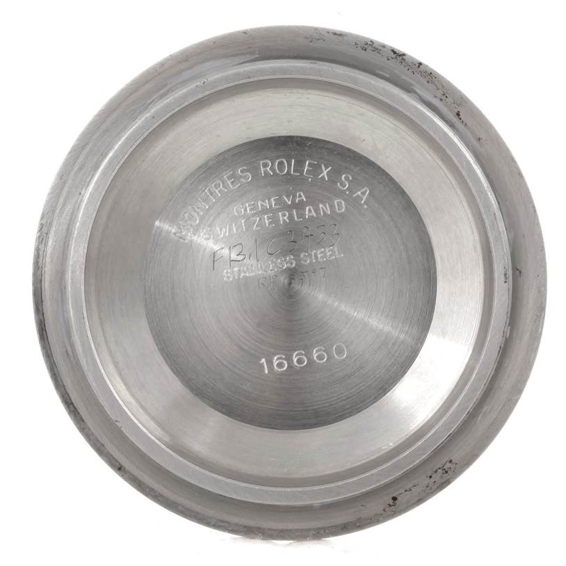 This image shows the case back of a Rolex Sea-Dweller 16660 Men's Stainless Steel Black Dial 16660 Men's Stainless Steel Black Dial watch model 16660 viewed from a top-down angle.