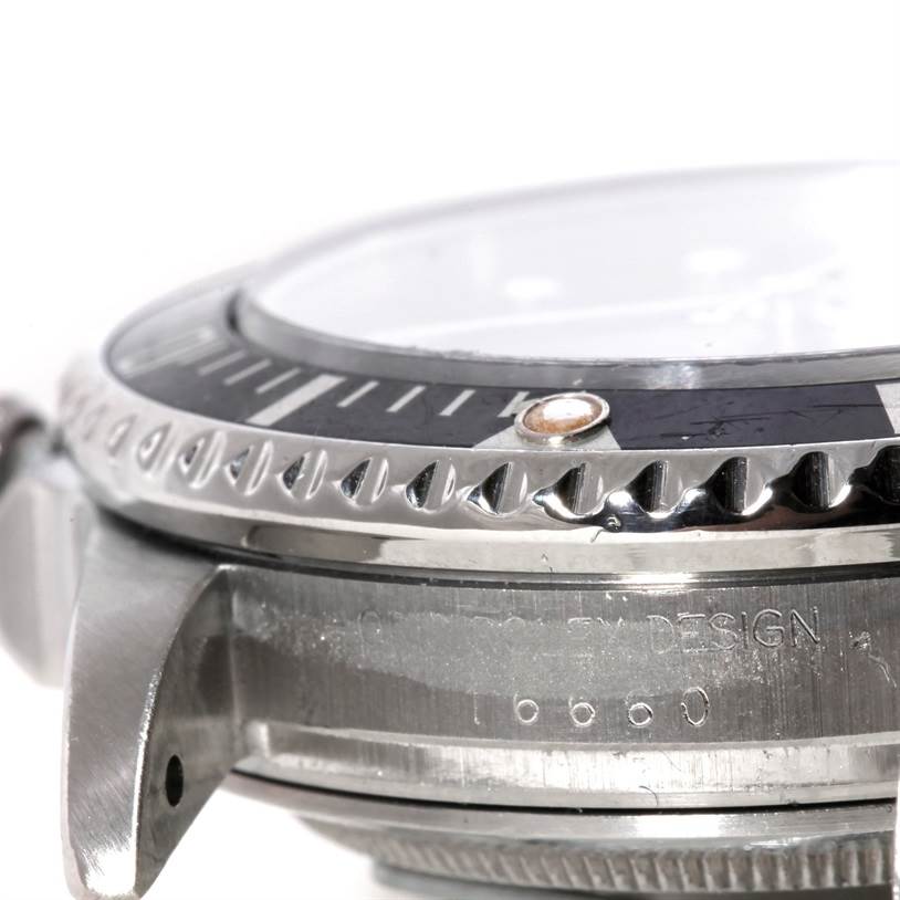 The image shows a close-up side view of the bezel, case, and lugs of a Rolex Sea-Dweller 16660 Men's Stainless Steel Black Dial 16660 Men's Stainless Steel Black Dial watch.