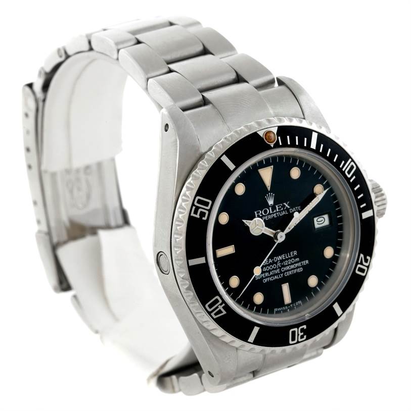 The image shows a side angle of a Rolex Sea-Dweller 16660 Men's Stainless Steel Black Dial 16660 Men's Stainless Steel Black Dial watch, featuring the bracelet, bezel, and dial.