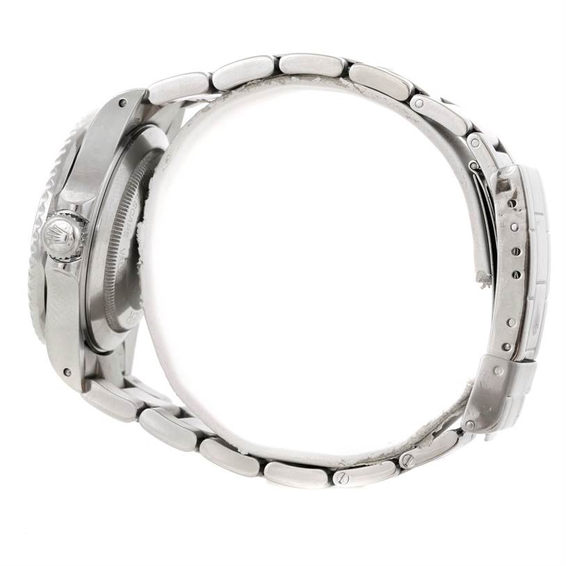 The image shows a side view of the Rolex Sea-Dweller 16660 Men's Stainless Steel Black Dial 16660 Men's Stainless Steel Black Dial watch, featuring its case, crown, and bracelet.