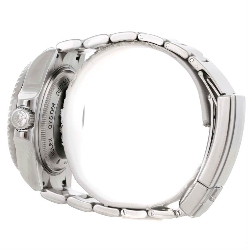 The image shows a side view of the Rolex Sea-Dweller 116660 Men's Stainless Steel Black Dial 116660 Men's Stainless Steel Black Dial's case, crown, case back, and metal bracelet.