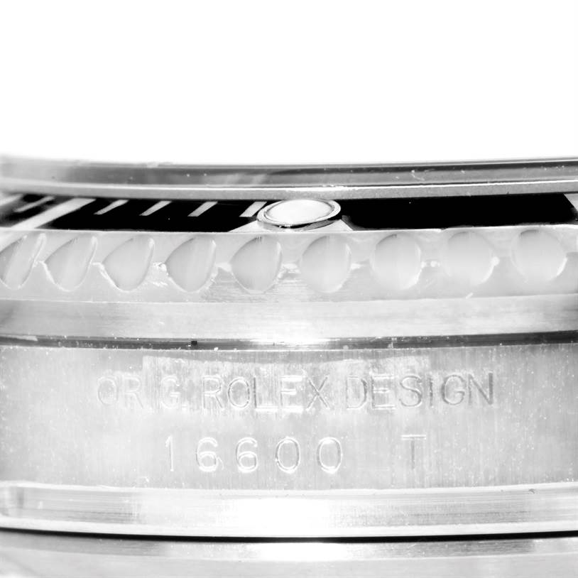 This image shows a close-up of the bezel and case side of the Rolex Sea-Dweller 16600 Men's Stainless Steel Black Dial 16600 Men's Stainless Steel Black Dial model 16600.