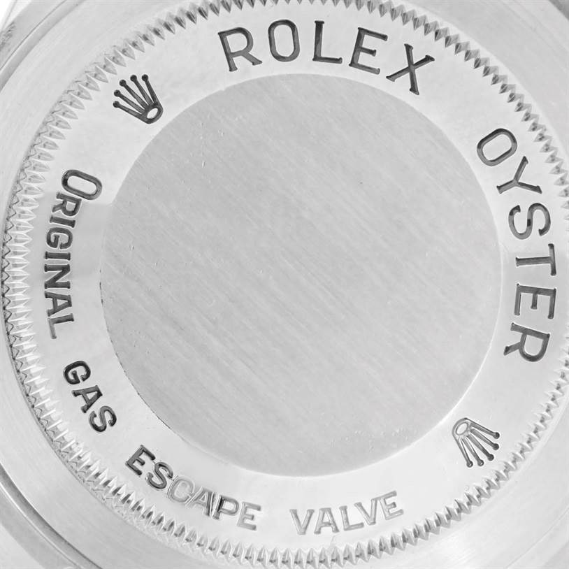 This image shows a close-up of the back case of the Rolex Sea-Dweller 16600 Men's Stainless Steel Black Dial 16600 Men's Stainless Steel Black Dial watch, with engraved text and the gas escape valve.