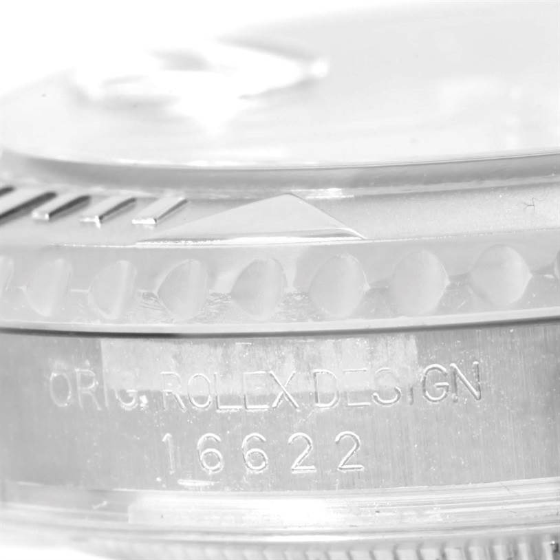 This close-up image shows the side of a Rolex Yacht-Master 16622 Men's Stainless Steel Silver Dial 16622 Men's Stainless Steel Silver Dial watch case, highlighting the engraved model number 16622.
