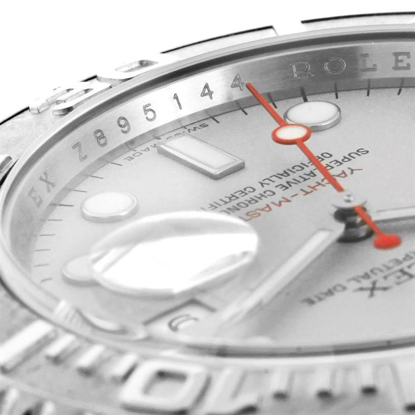 This close-up angle of the Rolex Yacht-Master 16622 Men's Stainless Steel Silver Dial 16622 Men's Stainless Steel Silver Dial watch shows part of the dial, the minute and second hands, and a portion of the bezel.