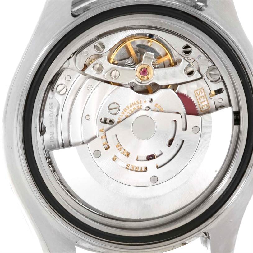 This image shows the intricate internal mechanism of a Rolex Yacht-Master 16622 Men's Stainless Steel Silver Dial 16622 Men's Stainless Steel Silver Dial watch from a rear angle.