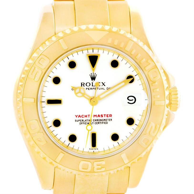 The image shows a frontal view of a Rolex Yacht-Master 68628 Men's Yellow Gold White Dial 68628 Men's Yellow Gold White Dial watch, highlighting its face, bezel, and partial bracelet.