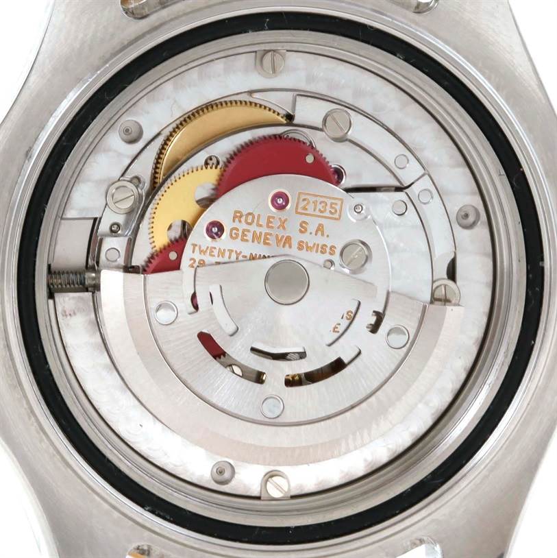 This image shows the internal mechanism of the Rolex Yacht-Master 68623 Men's Stainless Steel Blue Dial 68623 Men's Stainless Steel Blue Dial watch, focusing on the movement and gears.