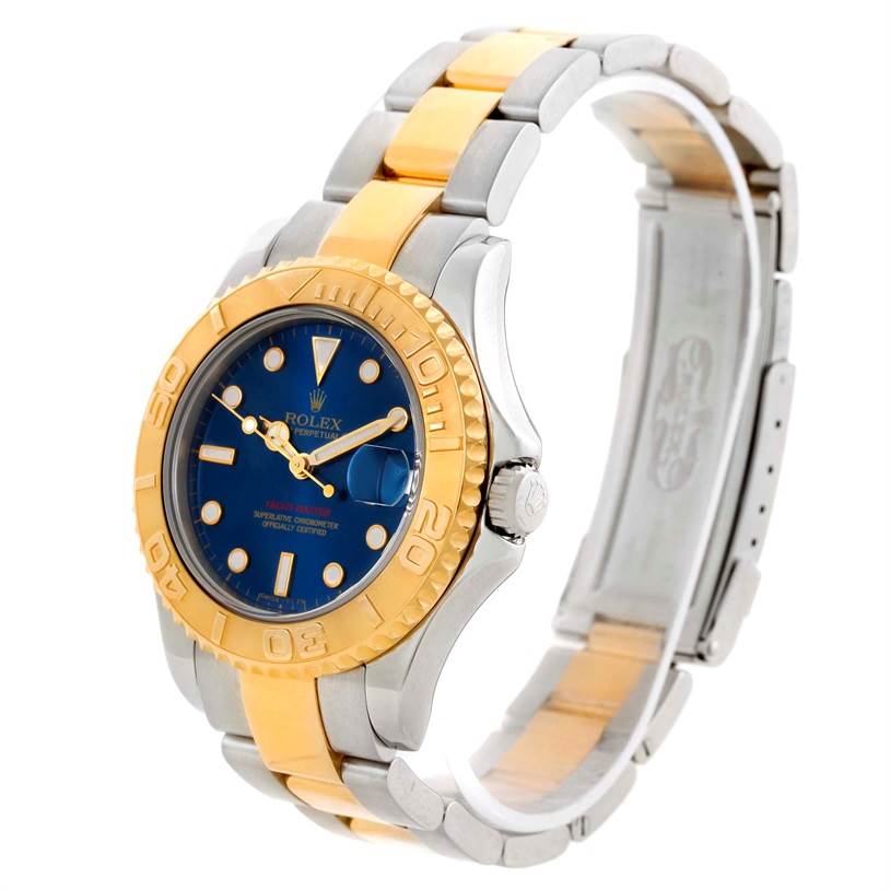 The Rolex Yacht-Master 68623 Men's Stainless Steel Blue Dial 68623 Men's Stainless Steel Blue Dial watch is shown at a three-quarter angle, highlighting the blue dial, gold bezel, and two-tone strap.