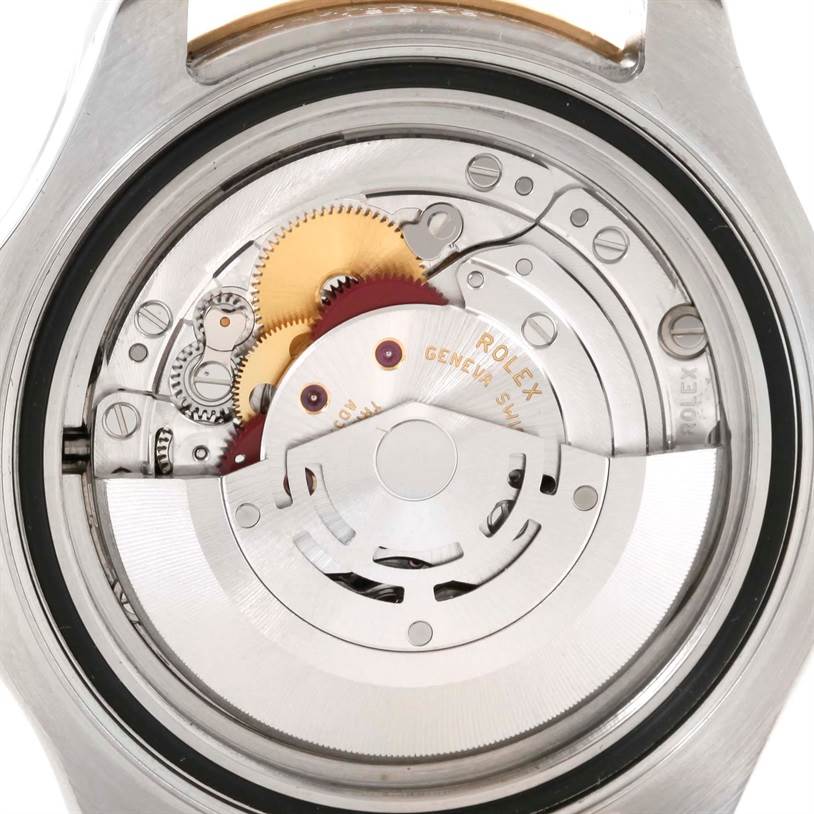 The image shows the back view of the Rolex Yacht-Master 16623 Men's Stainless Steel Champagne Dial 16623 Men's Stainless Steel Champagne Dial watch, highlighting its internal mechanical movement.