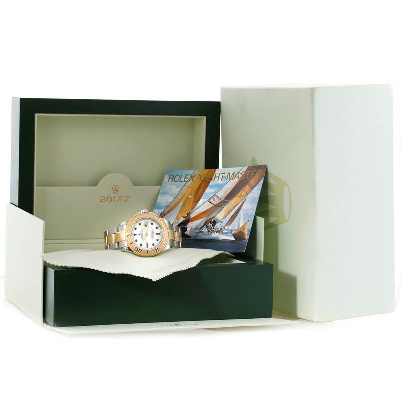 This image shows the Rolex Yacht-Master 16623 Men's Stainless Steel White Dial 16623 Men's Stainless Steel White Dial watch with its packaging, booklets, and box in an open position.