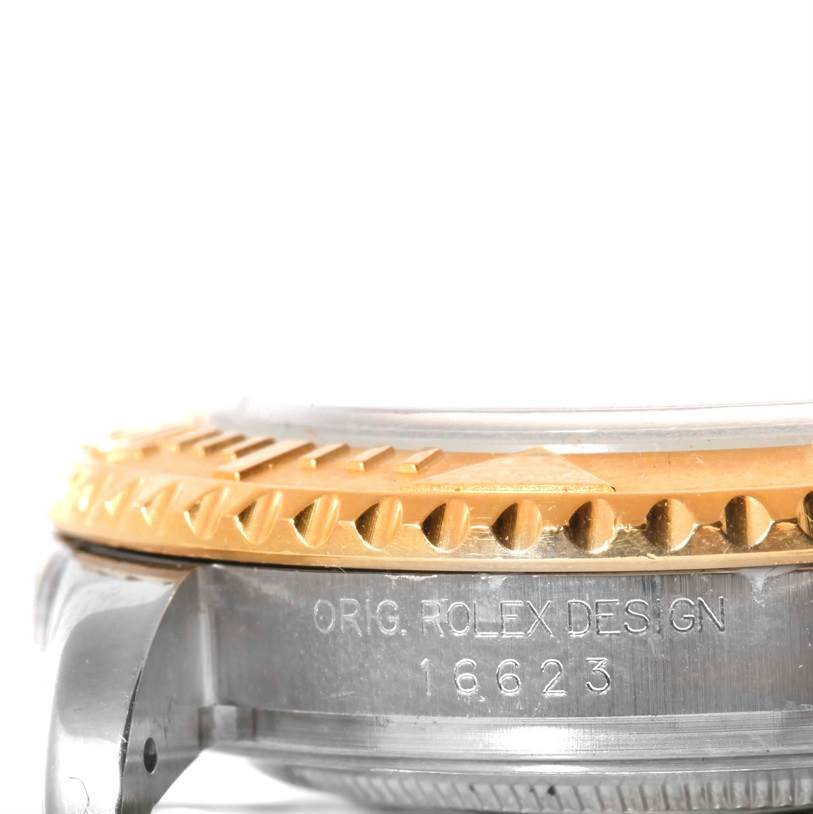 This close-up angle shows the case side and bezel of the Rolex Yacht-Master 16623 Men's Stainless Steel White Dial 16623 Men's Stainless Steel White Dial watch, including the model number engraved on the side.