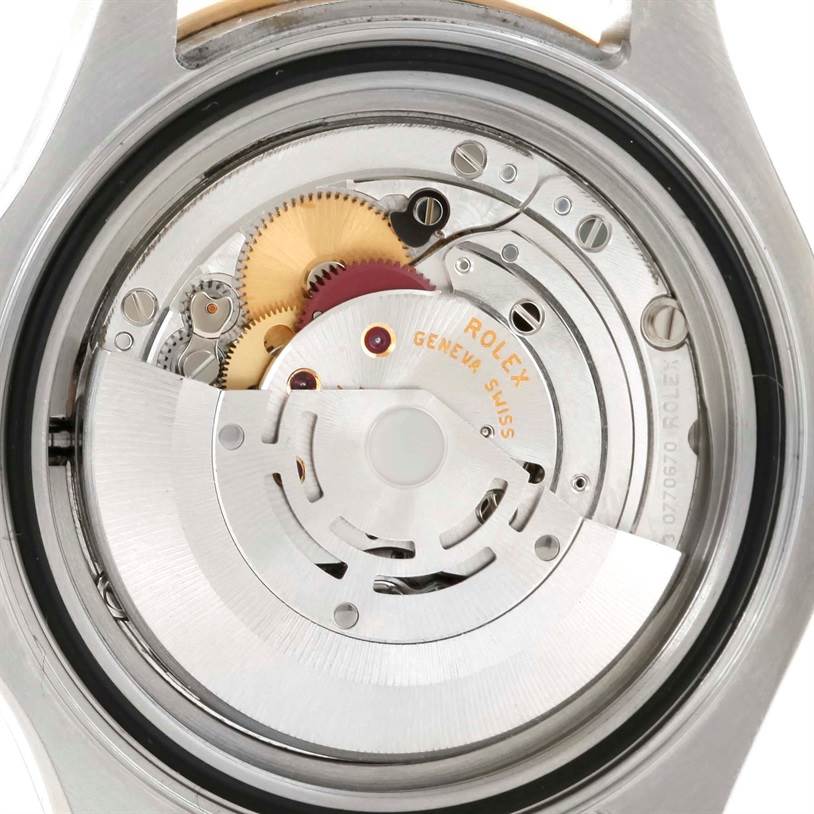 This image shows a close-up view of the movement mechanism of a Rolex Yacht-Master 16623 Men's Stainless Steel White Dial 16623 Men's Stainless Steel White Dial watch.