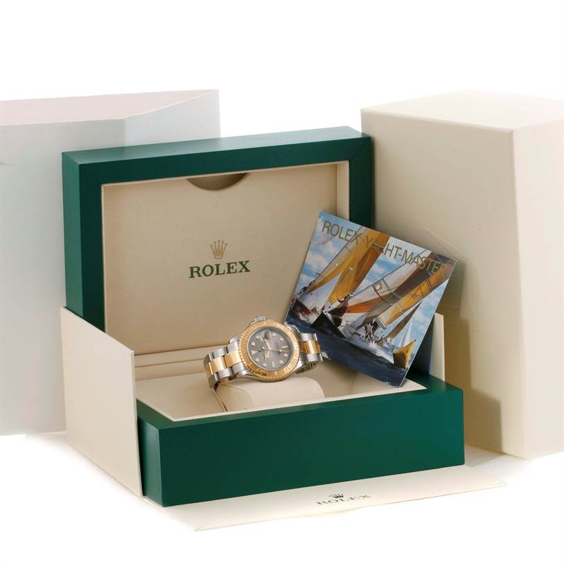 The image shows a Rolex Yacht-Master 16623 Men's Stainless Steel Grey Dial 16623 Men's Stainless Steel Grey Dial watch at a slight angle with its packaging and booklet.