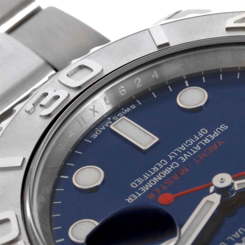 The image shows a close-up of the dial and bezel of a Rolex Yacht-Master 116622 Men's Stainless Steel Blue Dial 116622 Men's Stainless Steel Blue Dial watch, highlighting the hour markers and part of the bracelet.
