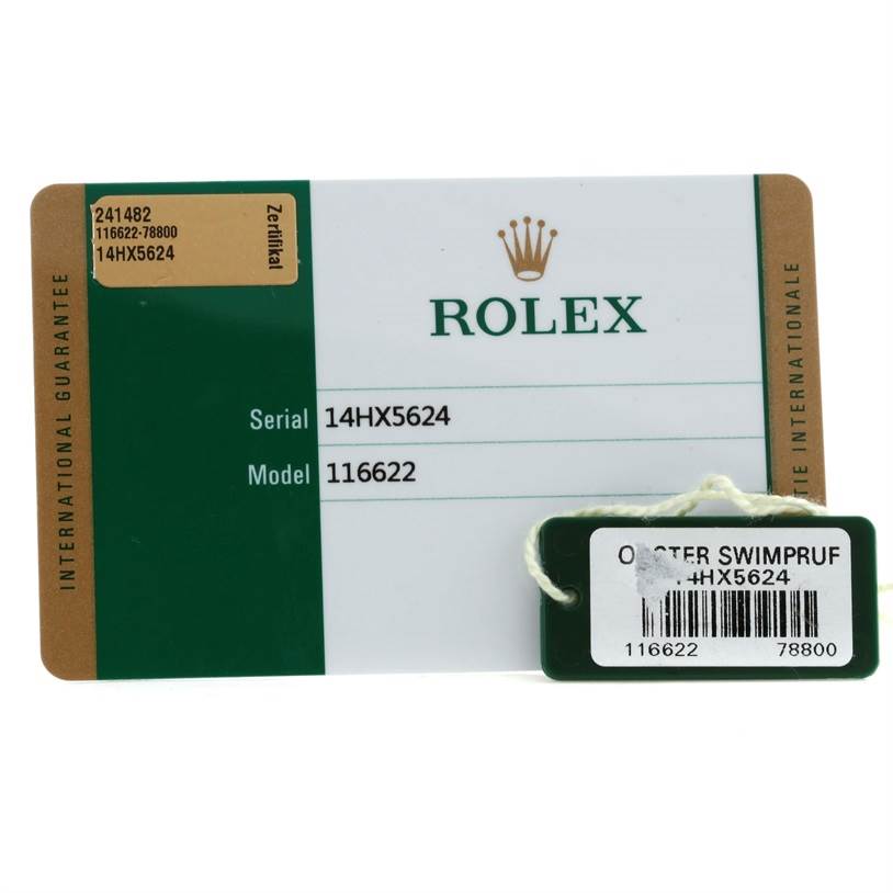 The image shows the certification card and Oyster Swimpruf tag for the Rolex Yacht-Master 116622 Men's Stainless Steel Blue Dial 116622 Men's Stainless Steel Blue Dial model 116622.