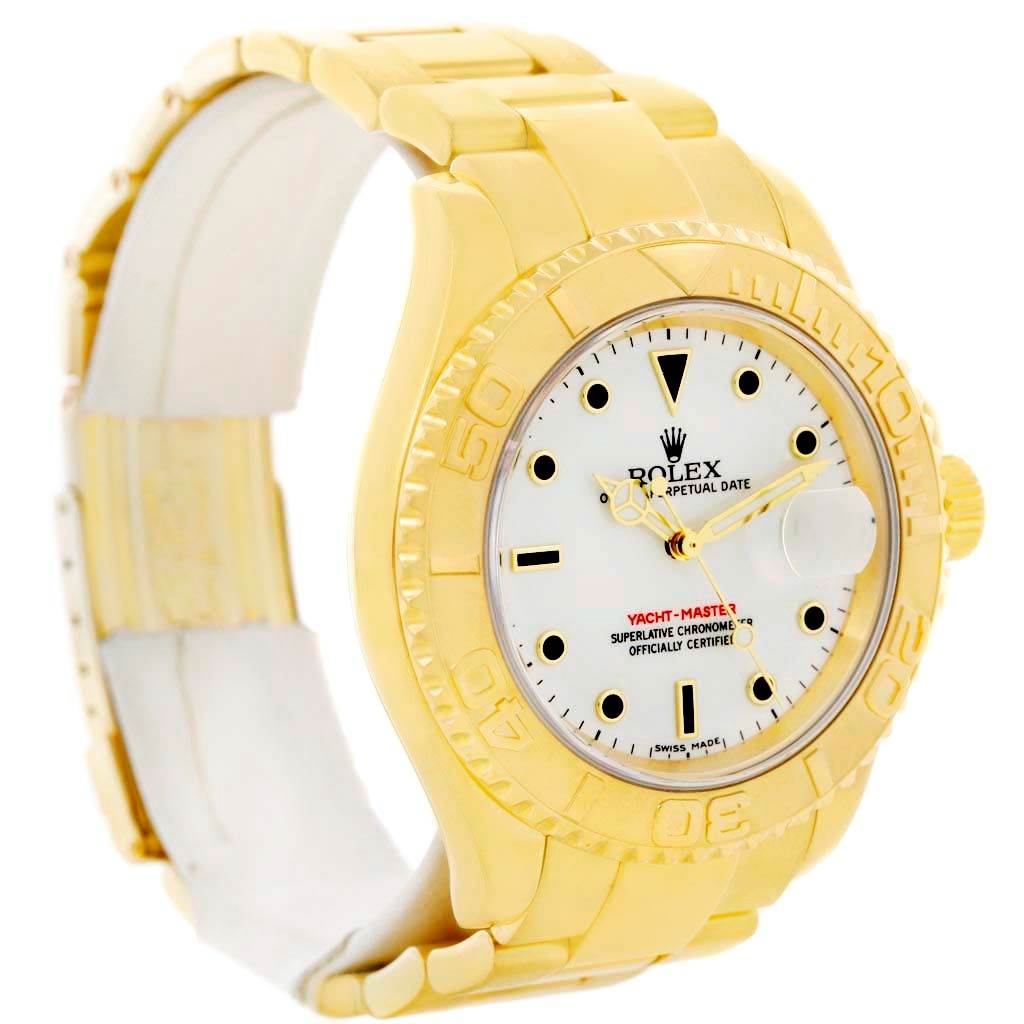 This image shows a Rolex Yacht-Master 16628 Men's Yellow Gold White Dial 16628 Men's Yellow Gold White Dial watch at a three-quarter angle, highlighting its gold bracelet, bezel, and white dial.