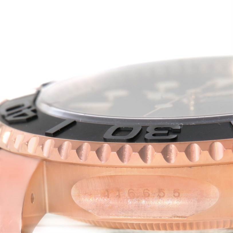 Close-up side view of a Rolex Yacht-Master 116655 Men's Rose Gold Black Dial 116655 Men's Rose Gold Black Dial showing the bezel and part of the case with the model number.