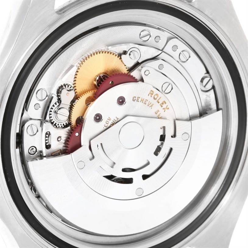 The image shows the back view of the Rolex Yacht-Master 116622 Men's Stainless Steel Blue Dial 116622 Men's Stainless Steel Blue Dial watch, focusing on its internal movement and gears.