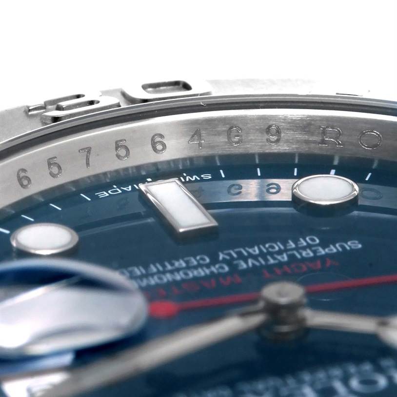 A close-up angle of the Rolex Yacht-Master 116622 Men's Stainless Steel Blue Dial 116622 Men's Stainless Steel Blue Dial watch showing the bezel, part of the dial, and markers.