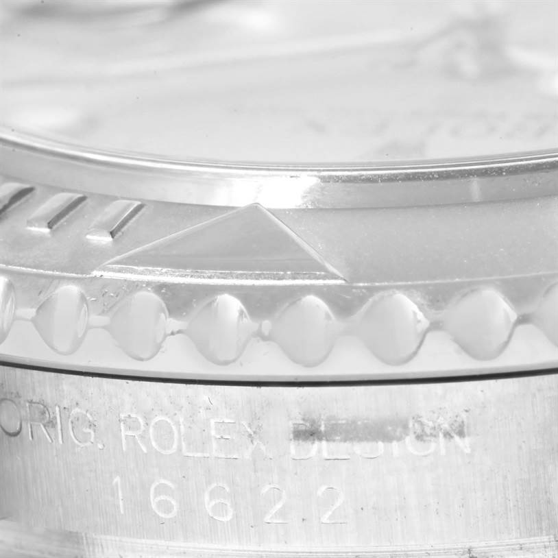 This close-up image shows the bezel, triangle marker, and engraved details of the Rolex Yacht-Master 16622 Men's Stainless Steel Silver Dial 16622 Men's Stainless Steel Silver Dial watch model.