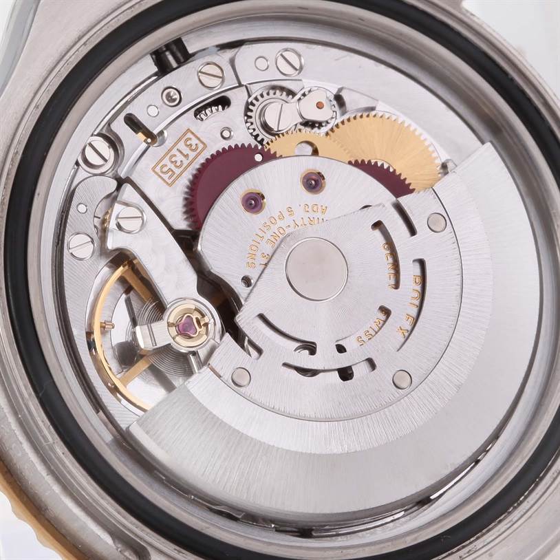 This image shows the internal movement mechanism of a Rolex Yacht-Master 16623 Men's Stainless Steel Grey Dial 16623 Men's Stainless Steel Grey Dial watch from a close-up, back angle.