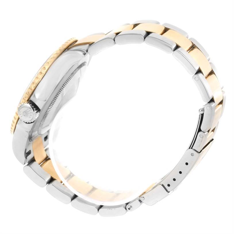 This side-angle view of the Rolex Yacht-Master 16623 Men's Stainless Steel Grey Dial 16623 Men's Stainless Steel Grey Dial watch shows the side profile, crown, and bracelet links.