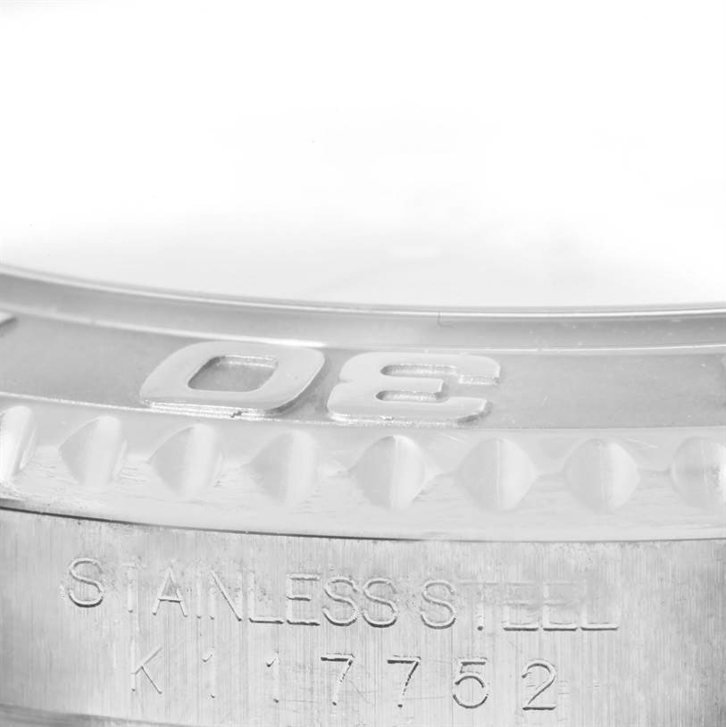 The image shows a close-up of the bezel and case back of a Rolex Yacht-Master 16622 Men's Stainless Steel Silver Dial 16622 Men's Stainless Steel Silver Dial watch, highlighting its stainless steel material and serial number.