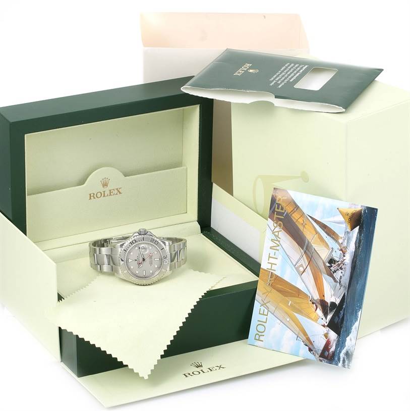 The image shows a Rolex Yacht-Master 16622 Men's Stainless Steel Silver Dial 16622 Men's Stainless Steel Silver Dial watch in its open box with an instruction manual and outer packaging.