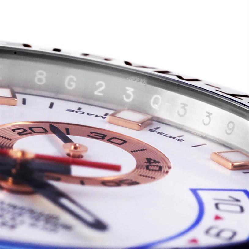 This close-up image shows the dial and minute markers of a Rolex Yacht-Master 116681 Men's Steel and Gold (two tone) White Dial 116681 Men's Steel and Gold (two tone) White Dial watch.