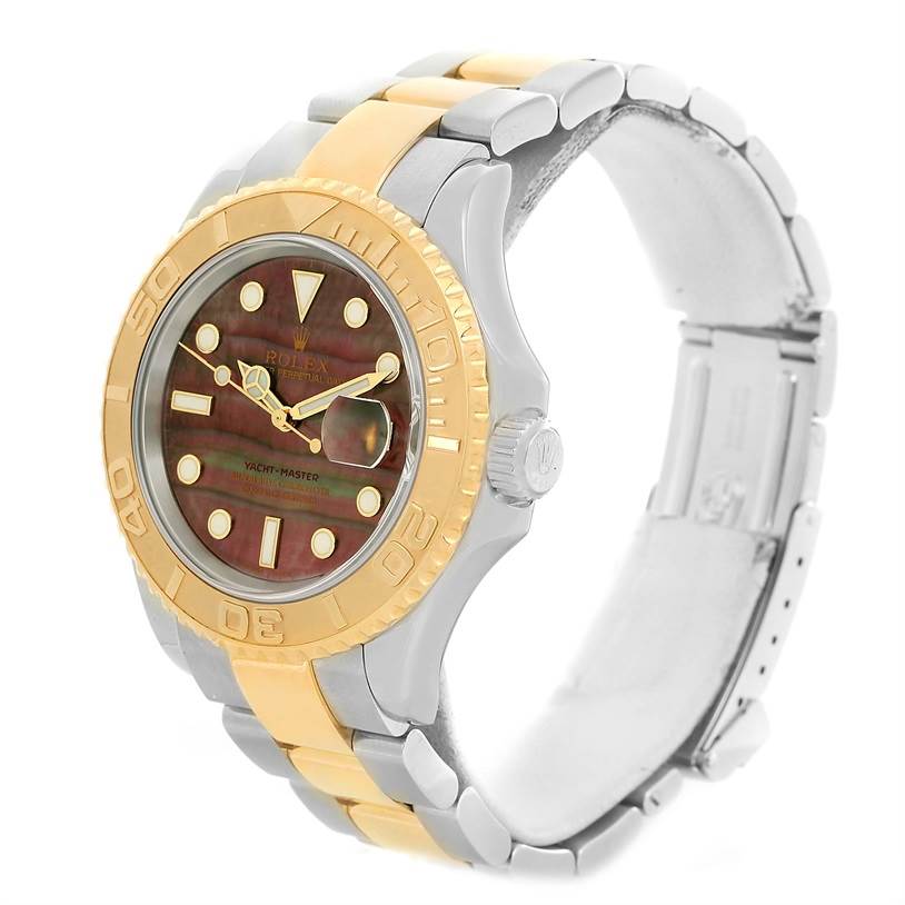 The Rolex Yacht-Master 16623 Men's Stainless Steel Mother of Pearl Dial 16623 Men's Stainless Steel Mother of Pearl Dial watch is shown from an angled side view, highlighting its gold and silver bracelet and bezel.