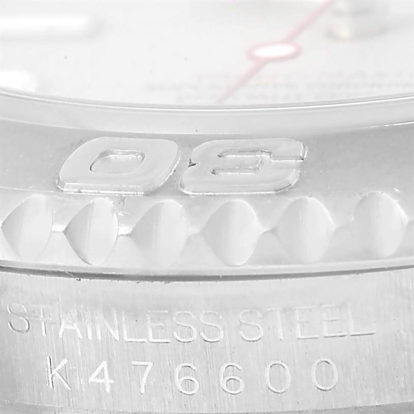 Close-up of the bezel and part of the case of the Rolex Yacht-Master 16622 Men's Stainless Steel Silver Dial 16622 Men's Stainless Steel Silver Dial watch, displaying "90" and the serial number.